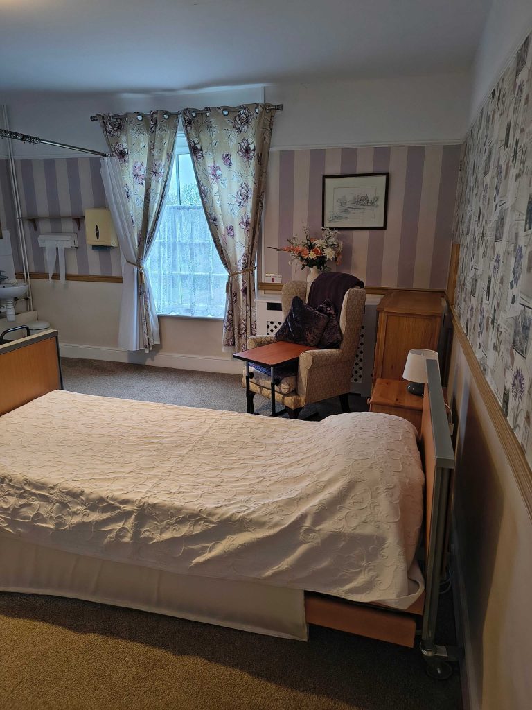 Cozy bedroom with floral curtains